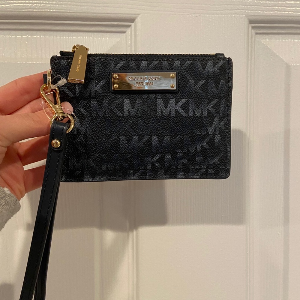 Brand new navy blue Michael Kors wristlet